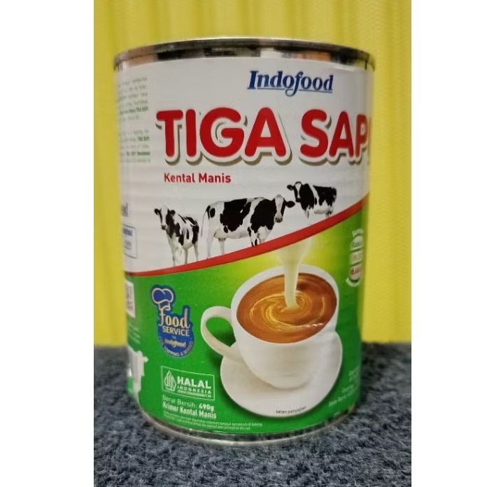 

susu kental manis Tiga Sapi Indofood krimer kental manis netto:490g