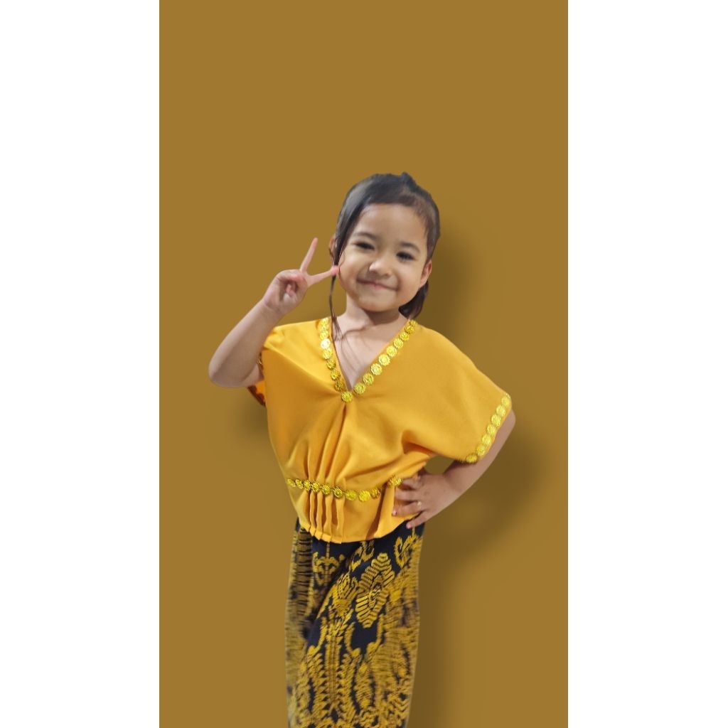 Setelan anak lambung Sasak viral warna kuning