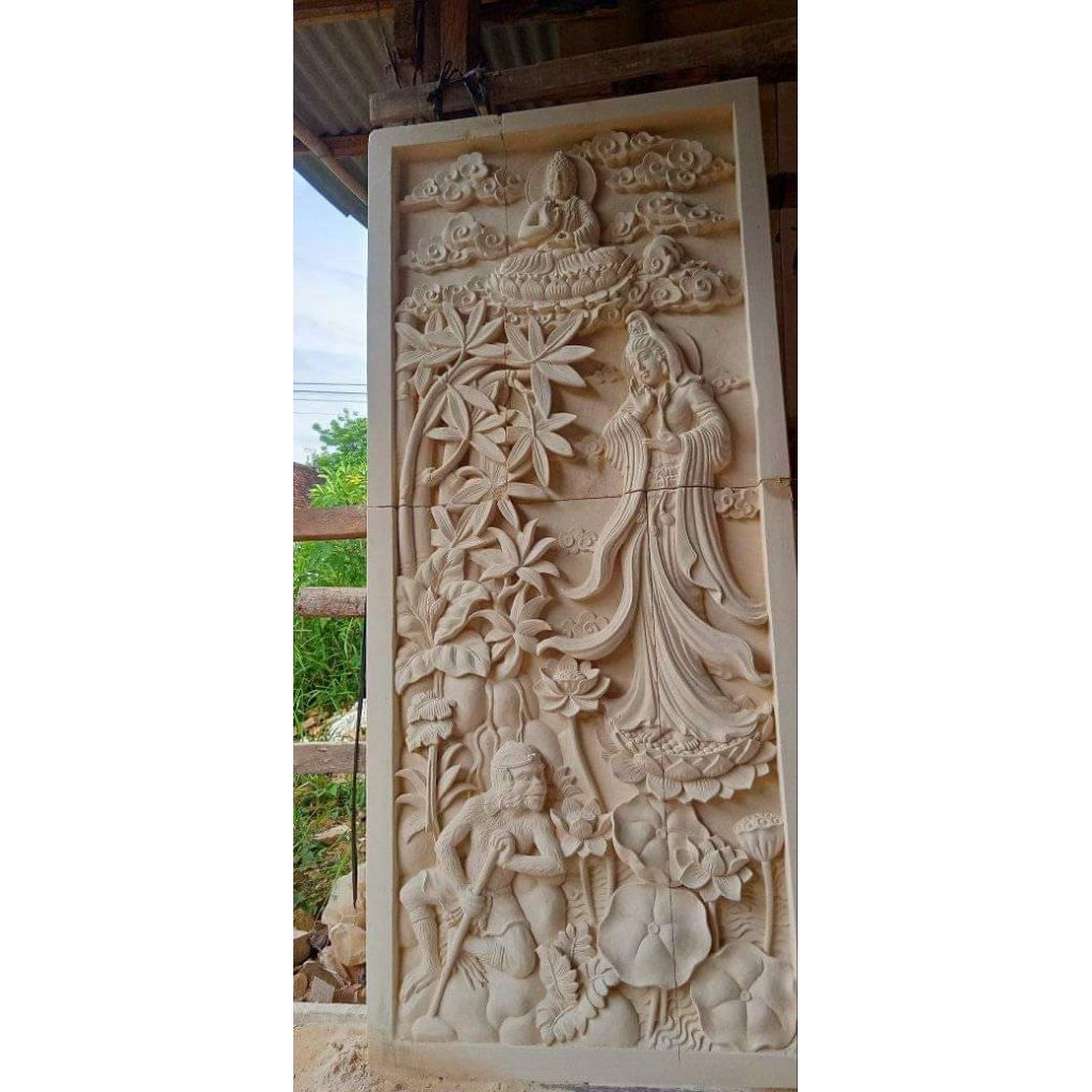 relief dinding batu alam paras jogja