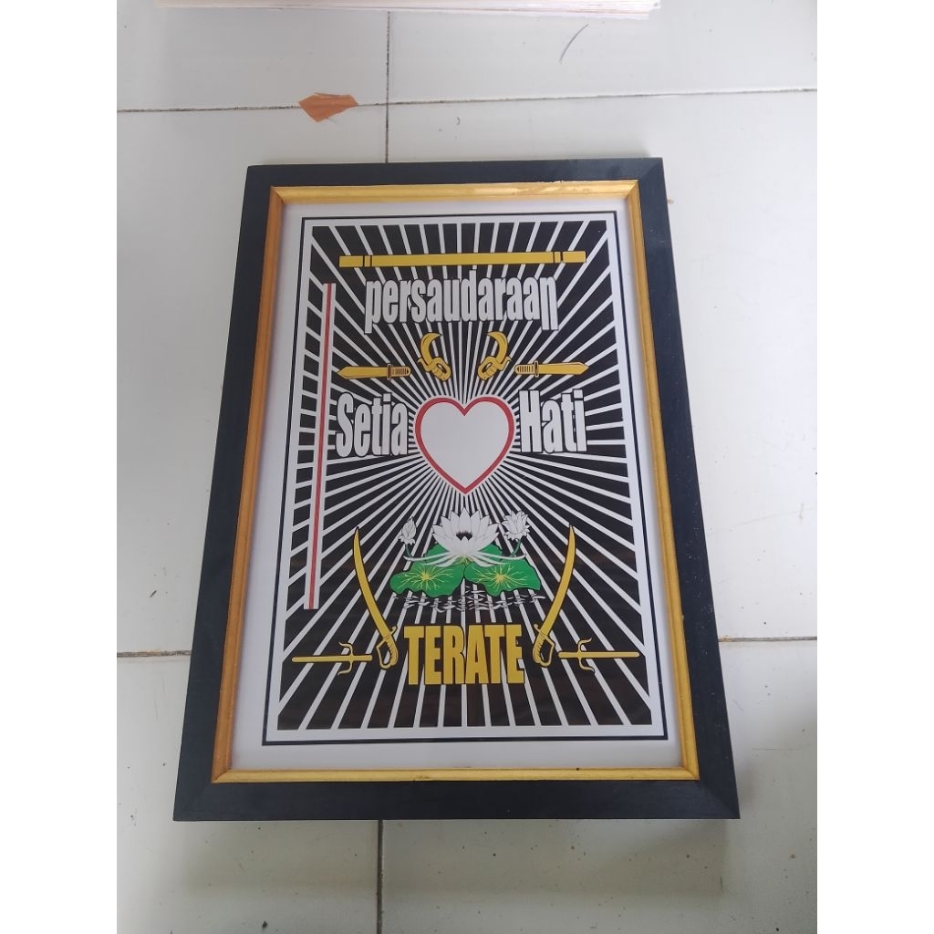 hiasan dinding lukisan cetak lambang PSHT ukuran 100x50 plus bingkai