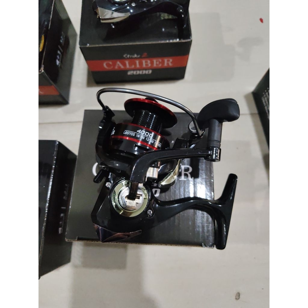 reel pancing strike 2 caliber pilihan 1000 sampao 8000 sudah one way tidak ada selah saat diputar