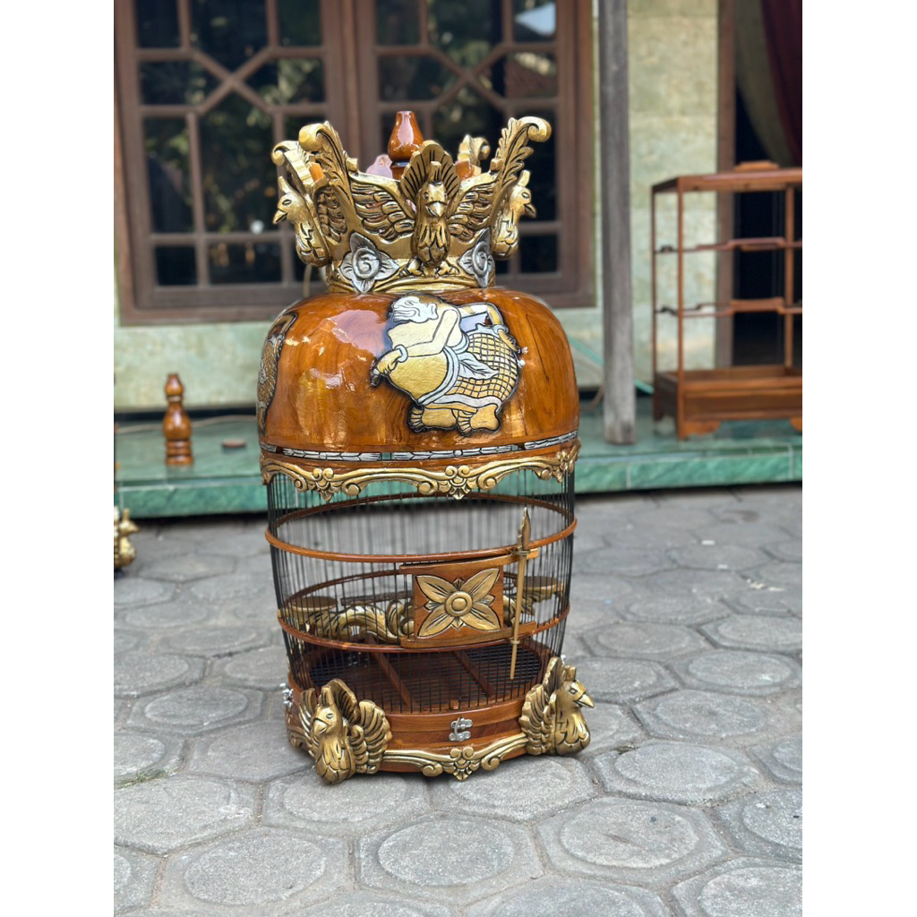 Sangkar Perkutut Bernuansa Ukiran Semar Dan Merak