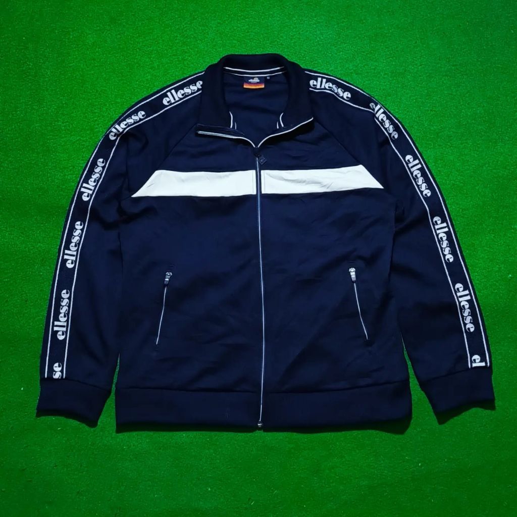 tracktop ellesse spell out tapped