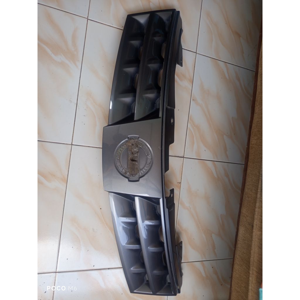 Grill depan grand livina L10 original copotan mobil