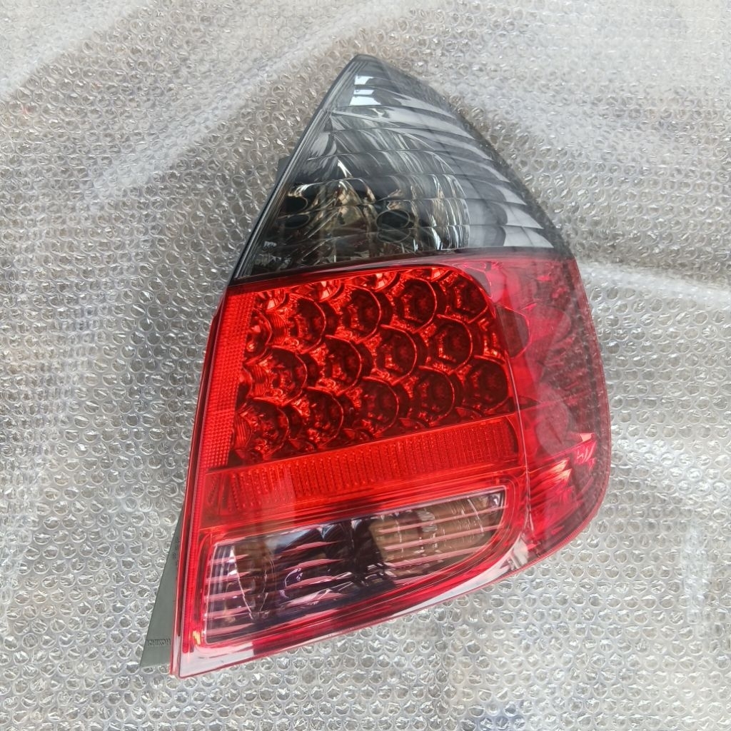 stoplamp lampu belakang Honda jazz GD3 kiri original