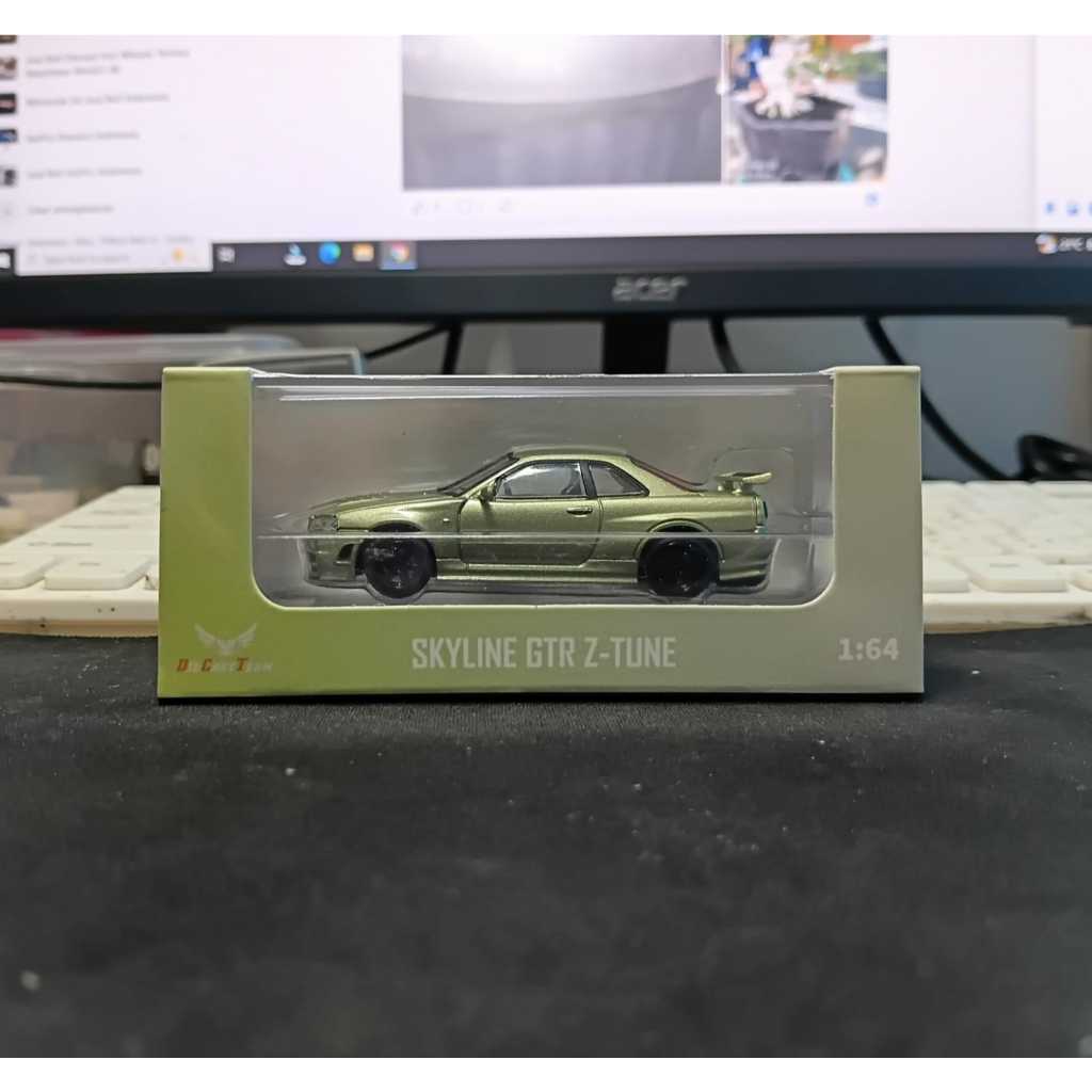 DCT x Topart 1:64 Nissan Skyline R34 Z-Tune MILLENIUM JADE