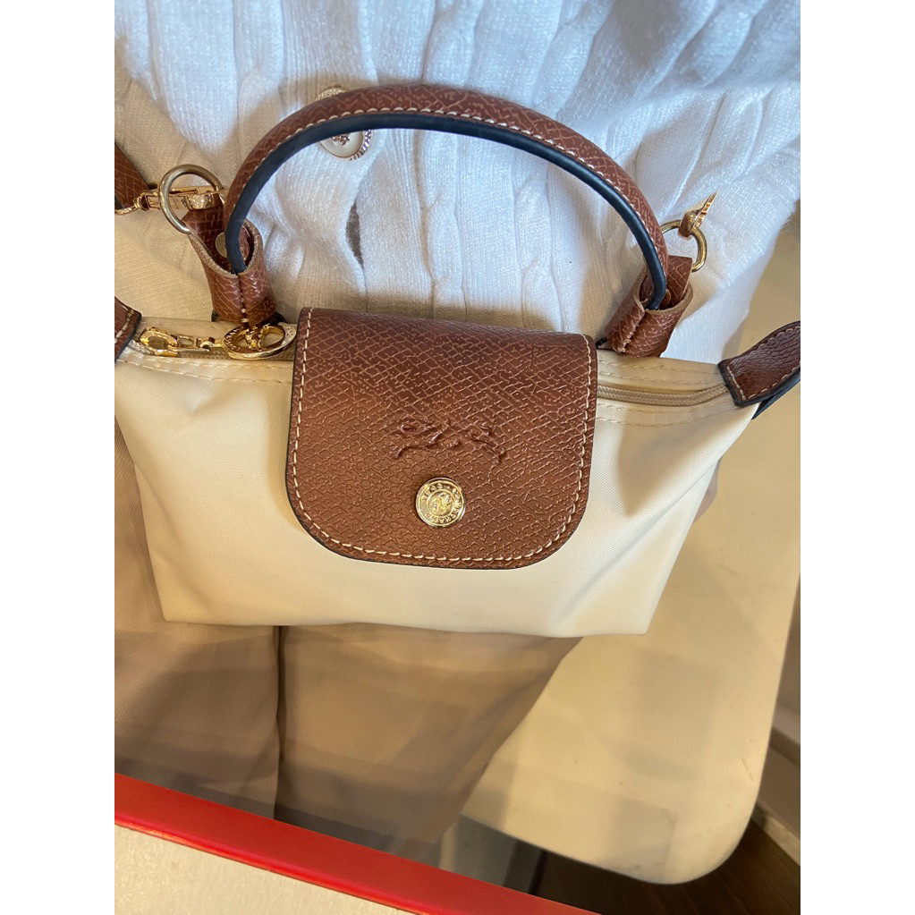 tas longchamp mini pouch