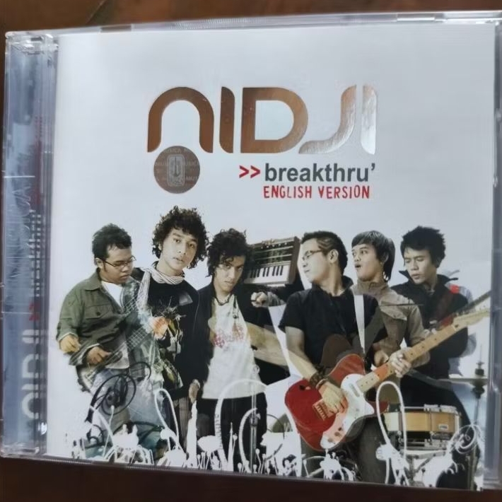 CD Musik original NIDJI breakthru English Version