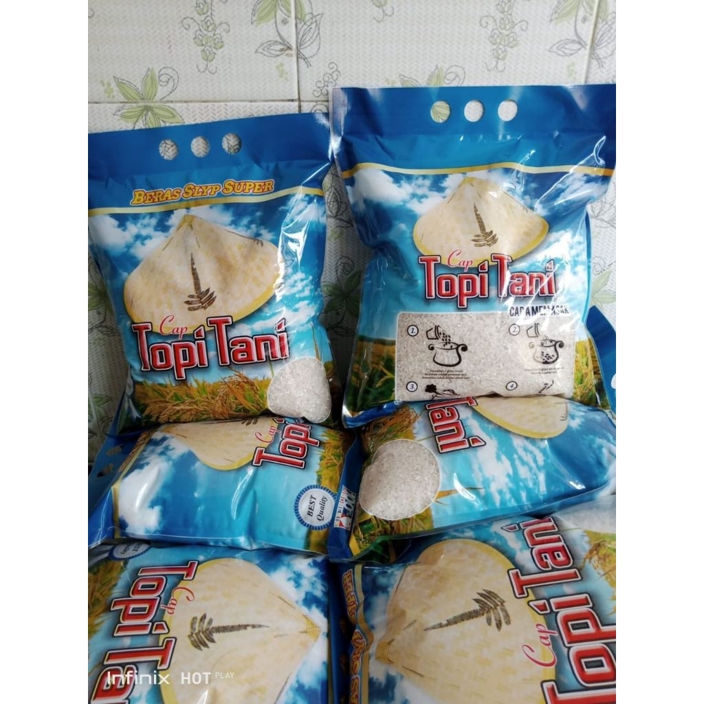 

beras 2kg topi tani