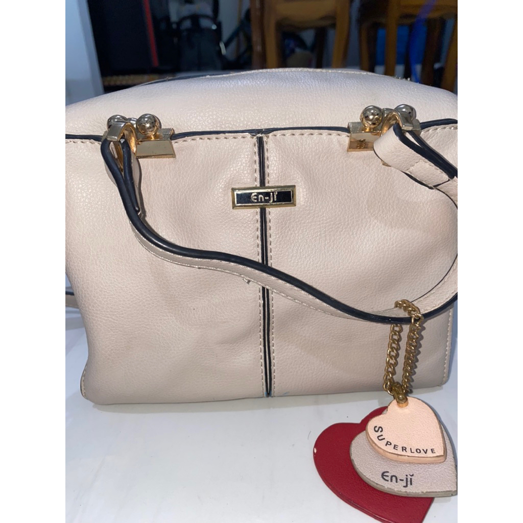 Tas selempang mini merk Enji
