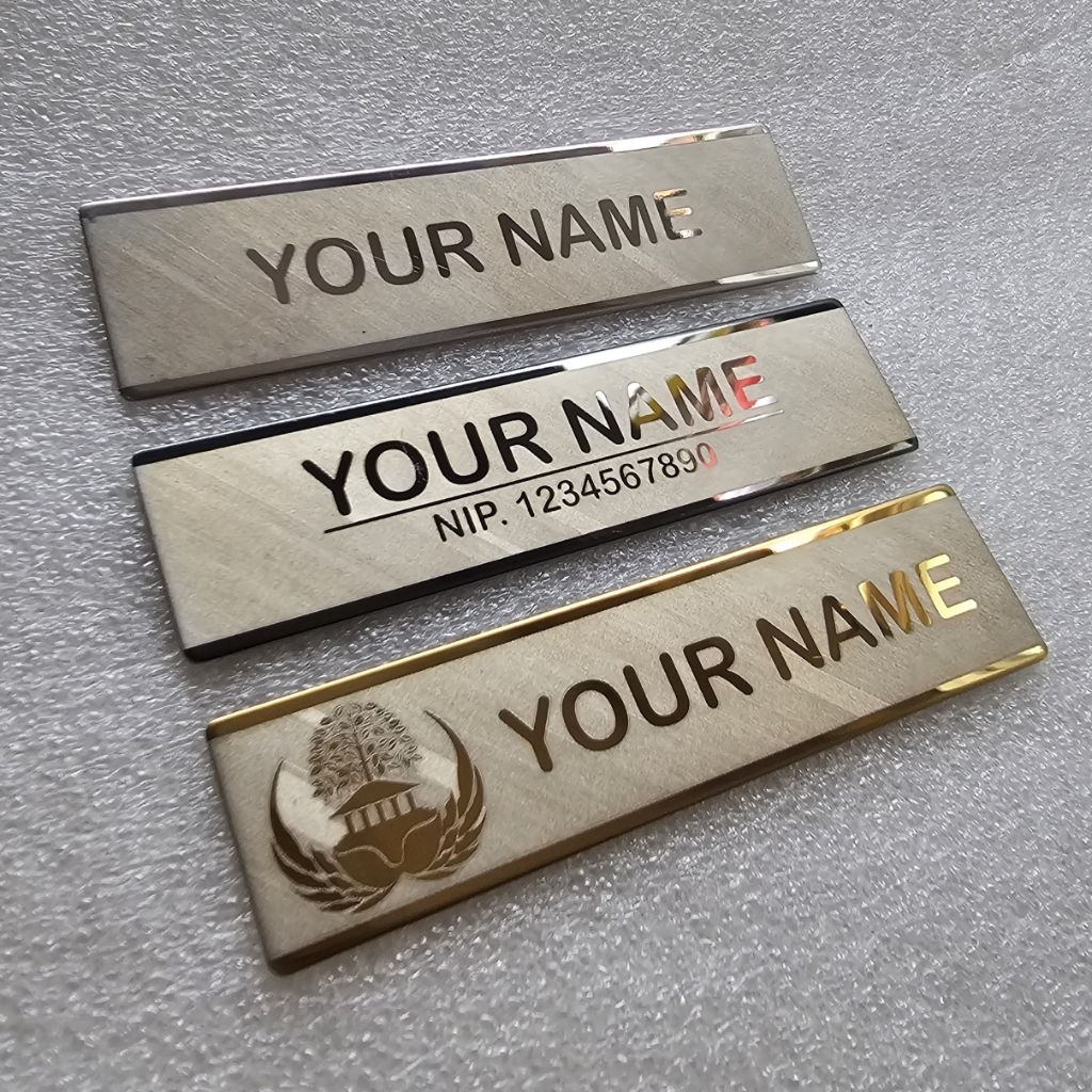 

Nama Dada Laser Titanium Mirror Papan Nama Magnet Premium Motif Asir