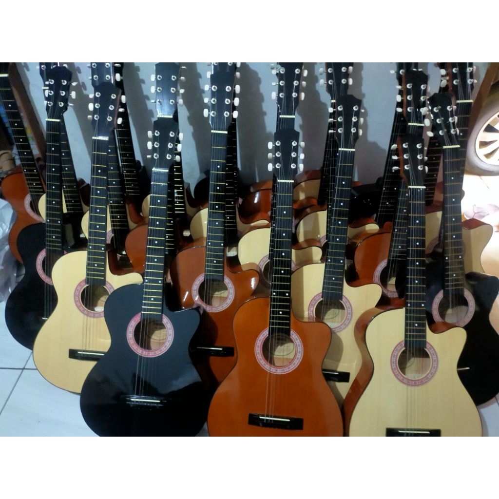 gitar pemula .puteran biasa .