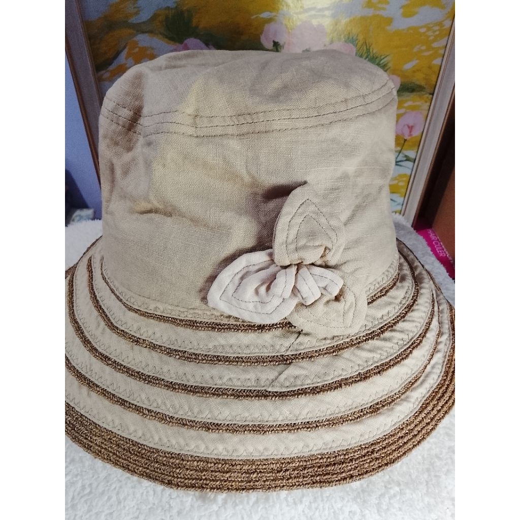 topi bulat wanita warna coklat muda