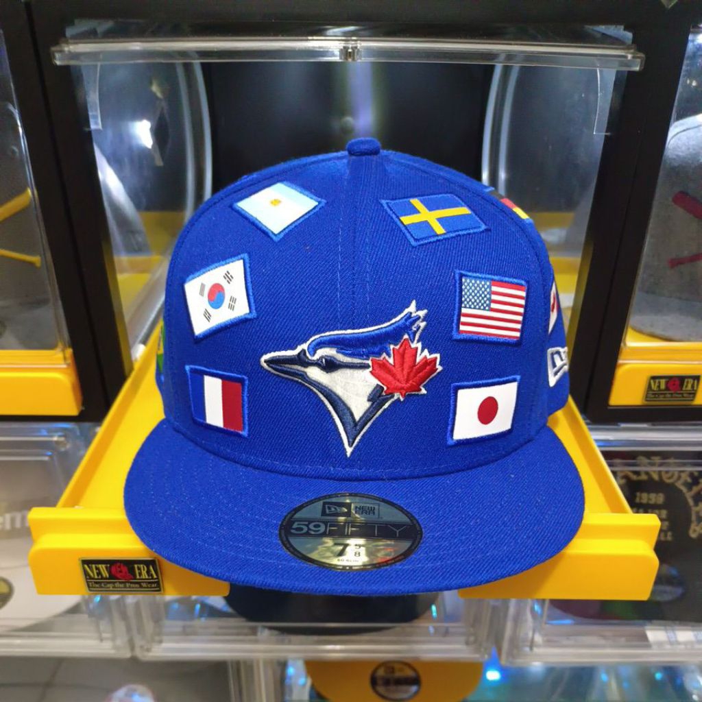Topi New Era X Blue Jays all over flag