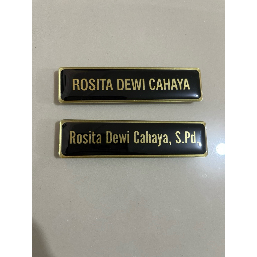 nama dada bahan gold atau kuningan