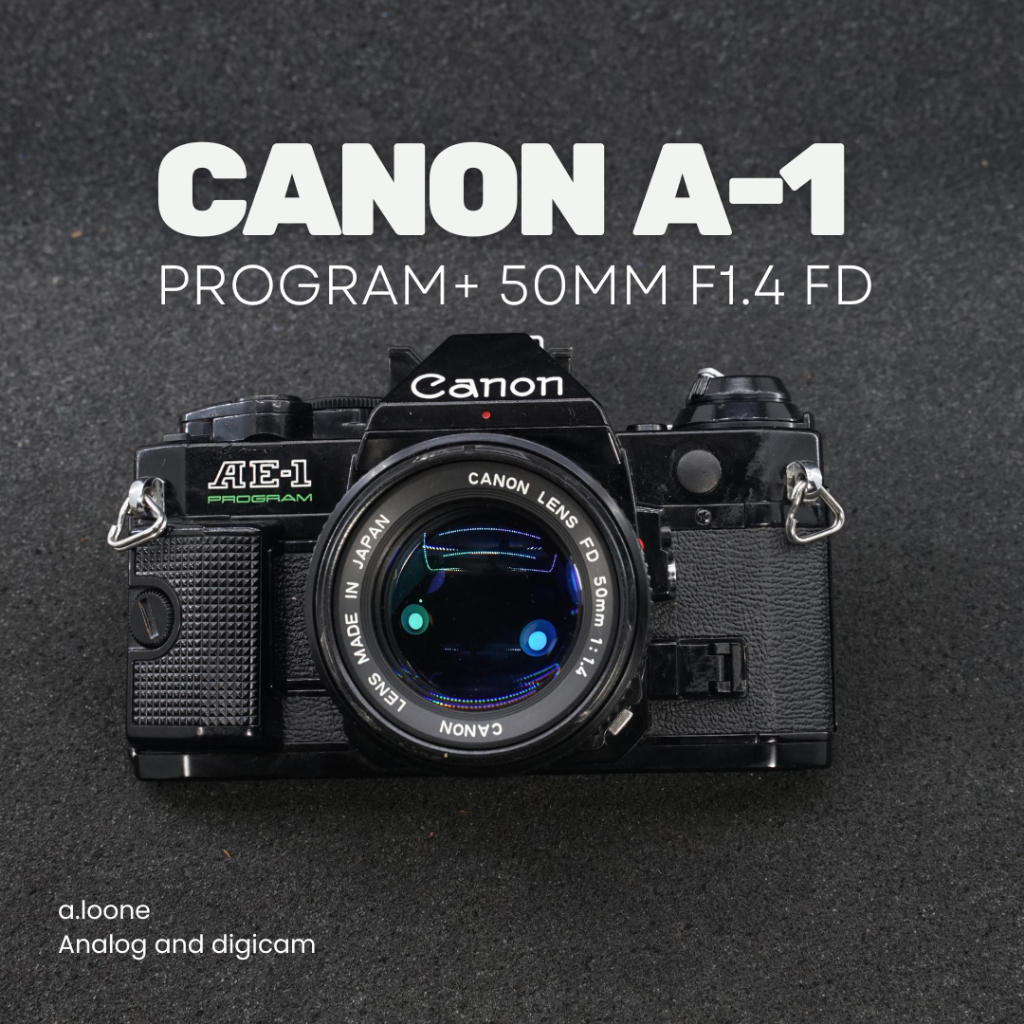ANON AE-1 PROGRAM BLACK + LENS CANON FD 50MM F/1.4 — KAMERA ANALOG 35MM SLR