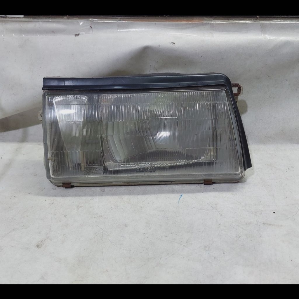 Headlamp kiri ford laser 85 - 88 esuse