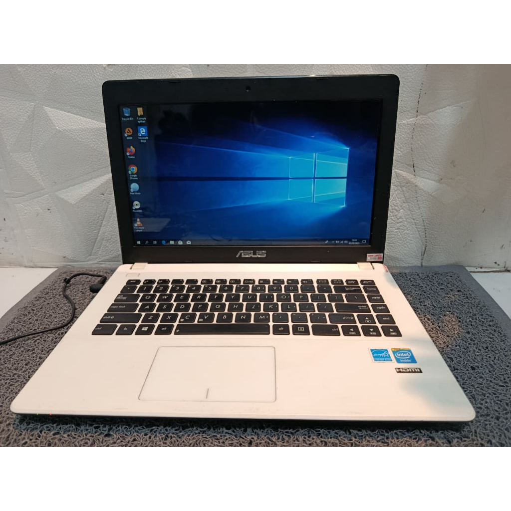 Laptop Asus X451C  Processor inter Celeron CPU 1007U 1.5GHz Ram 2 GB Penyimpanan 500 GB Display Inte