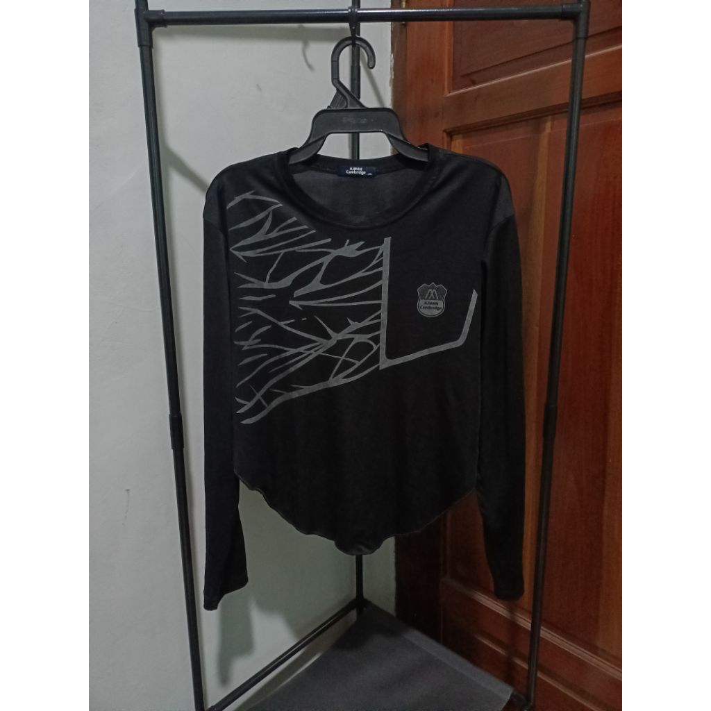 Baju olahraga crop oval
