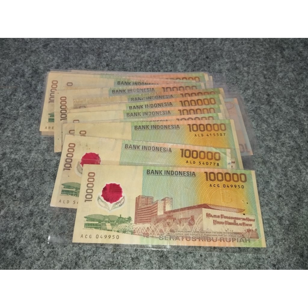 uang kertas kuno 100 rb polymer kondisi utuh kurang bagus