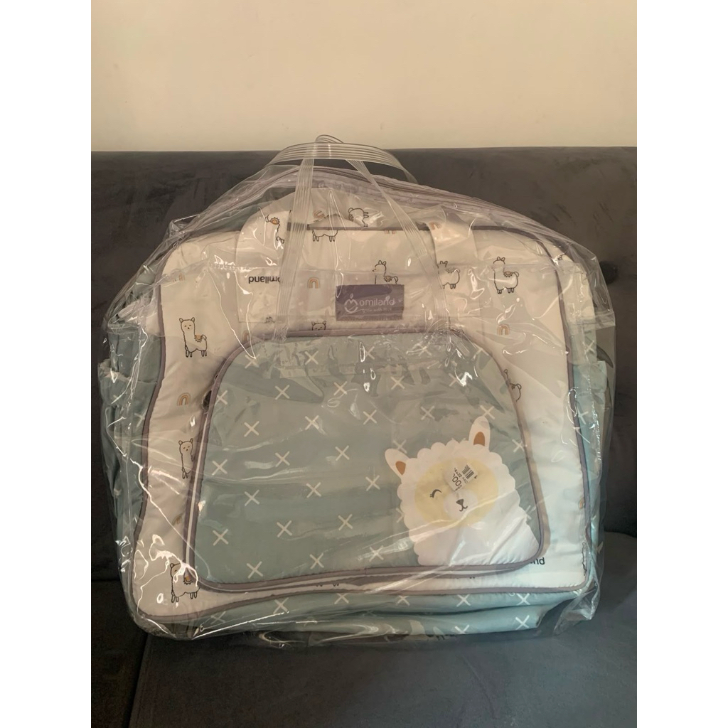 Tas bayi Omiland