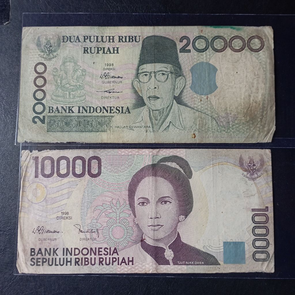 2 lembar uang kertas 10000&20000 bekas asli jelek