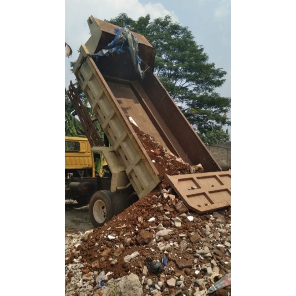urukan tanah campur puing