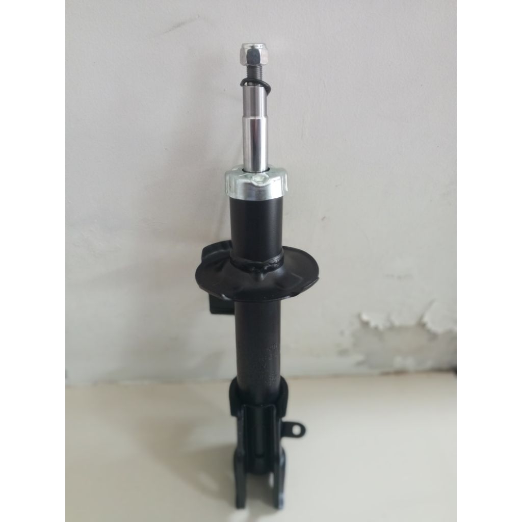 Shockbreaker Calya depan KIRI