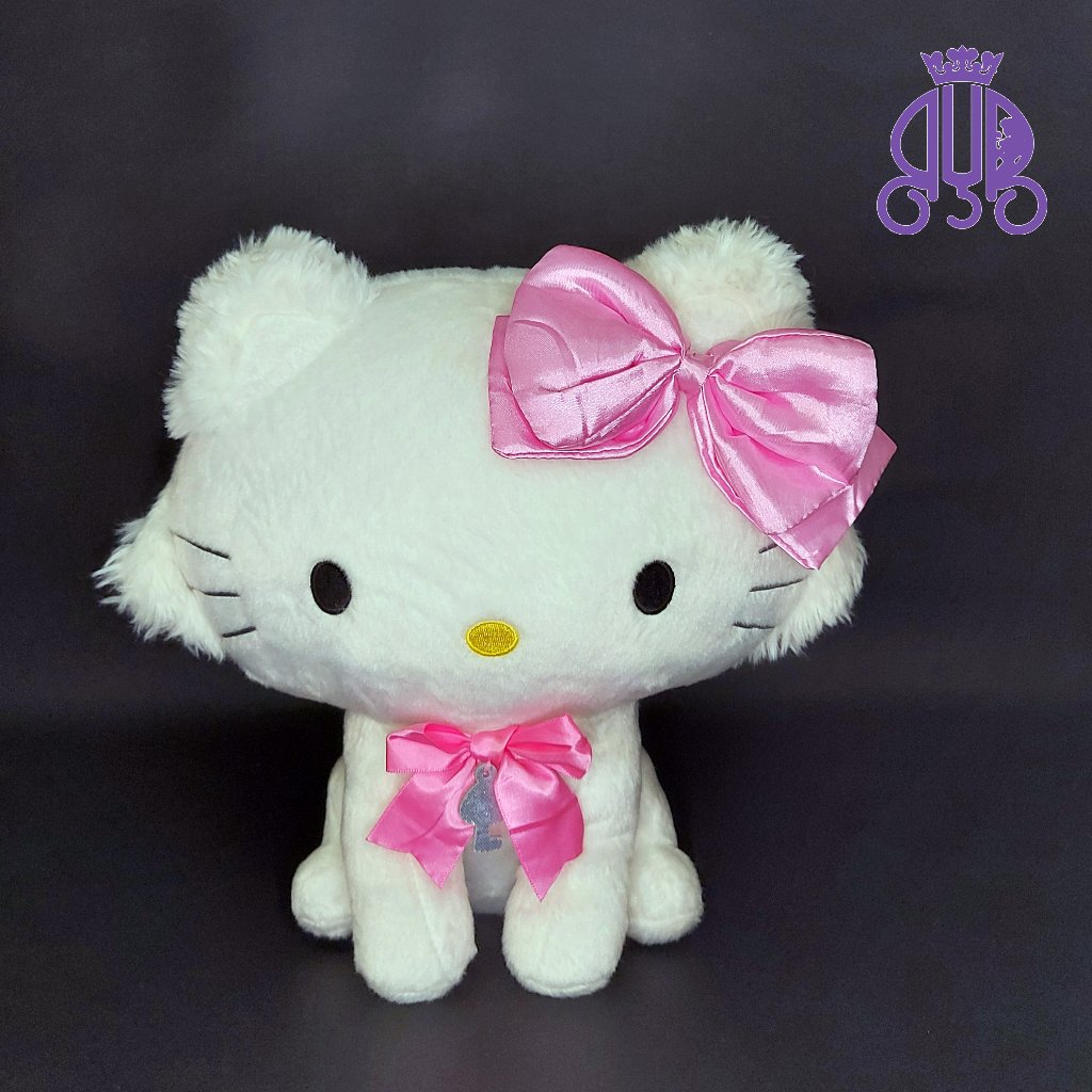 Boneka karakter kucing Charmmy Kitty pita merah muda