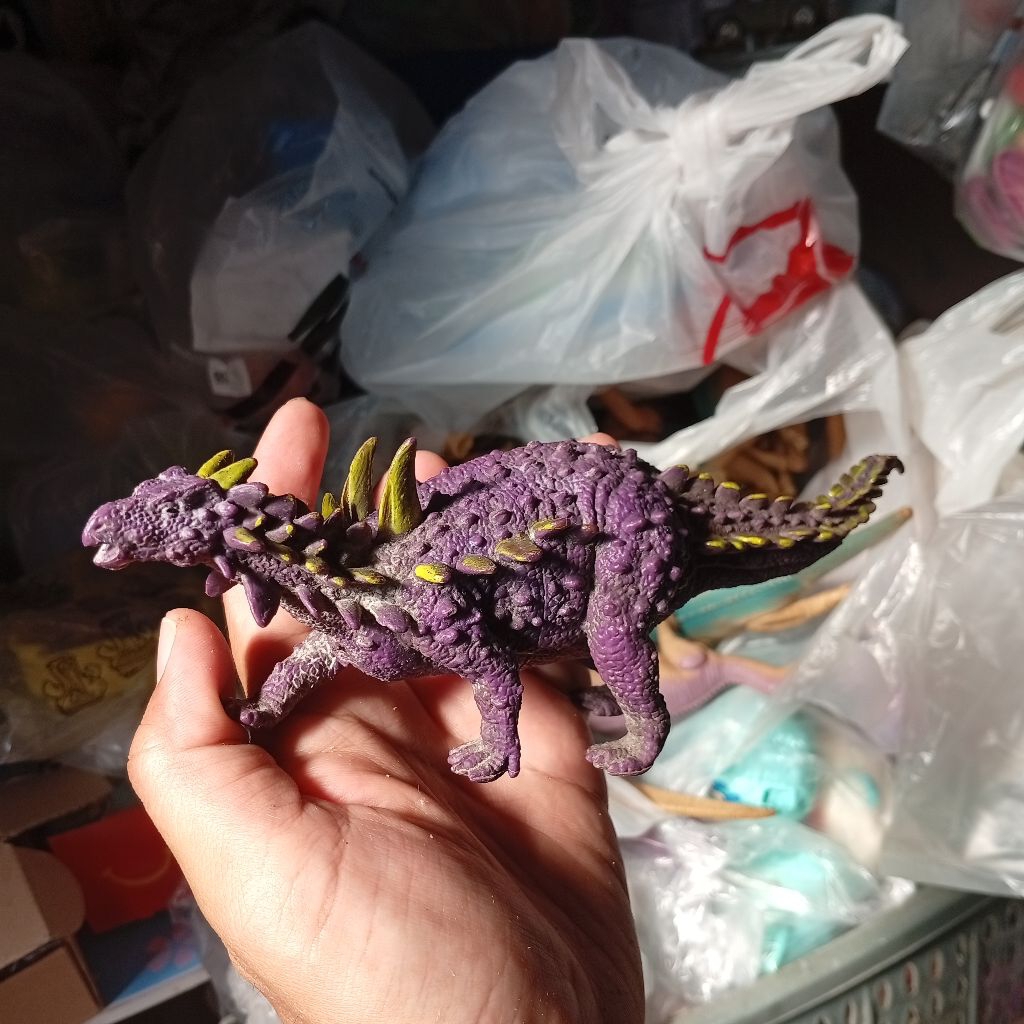 dinosaurus toys purple green dino