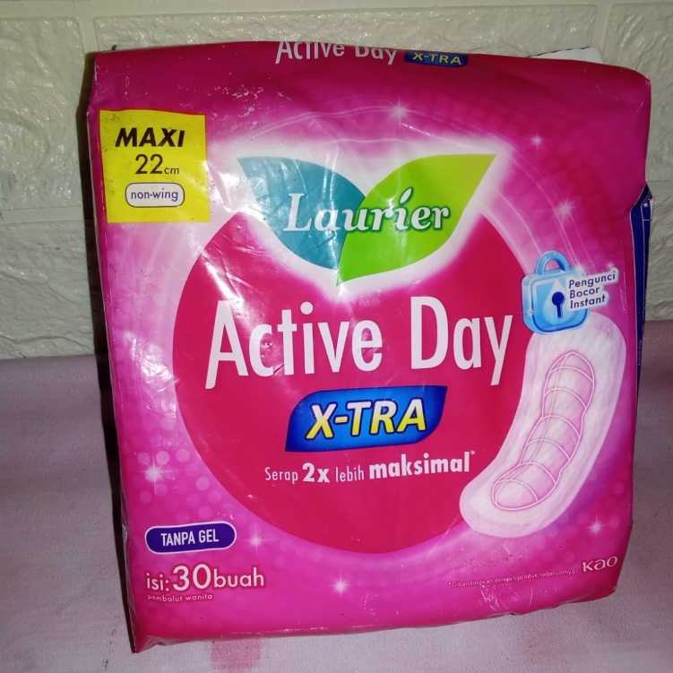 Laurier Active Day softex ( kemasan luntur dan sedikit sobek )