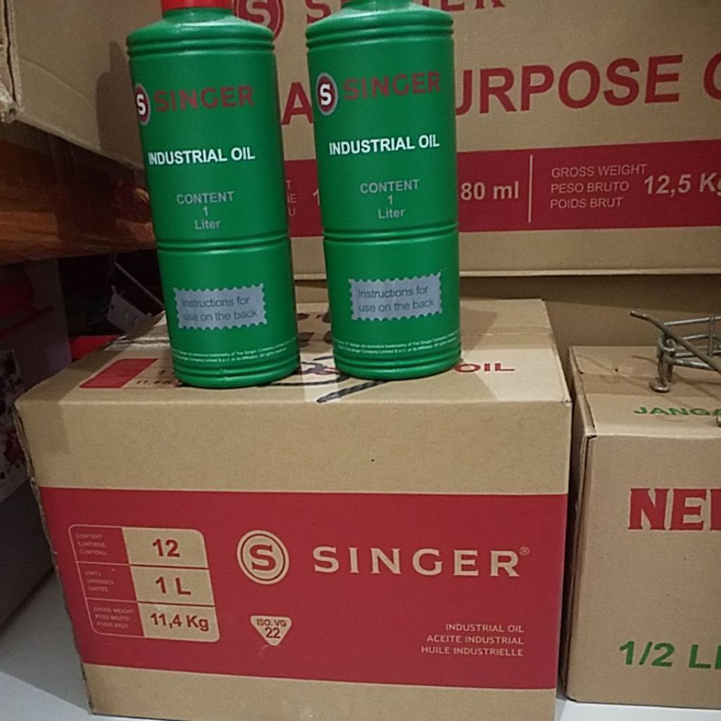 

MINYAK SINGER 1LT( per dos isi 12 botol)