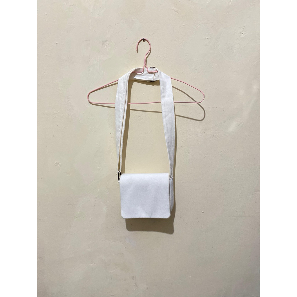 Tas selempang putih