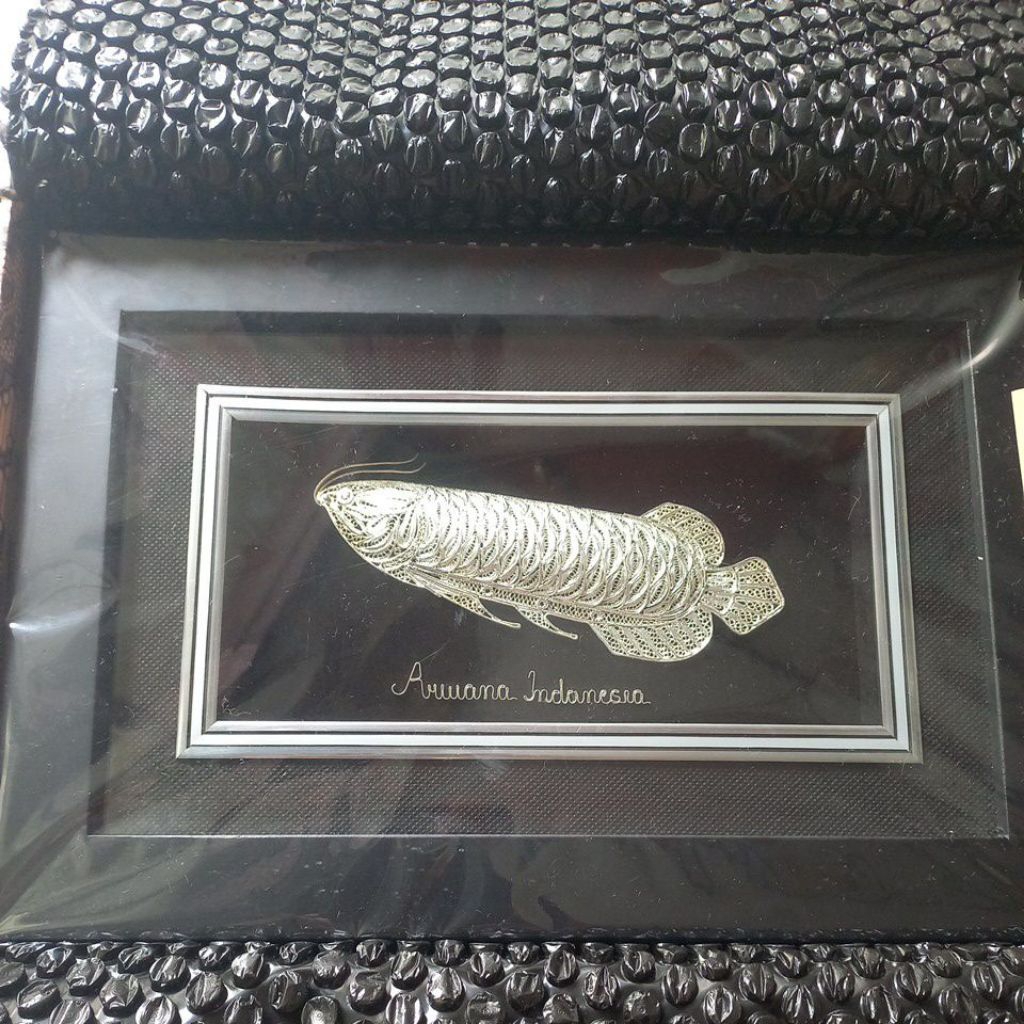 miniatur ikan arwana perak