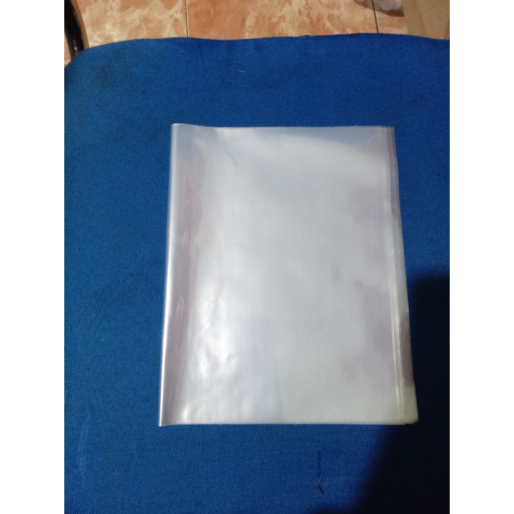 

plastik buku bening , buku sekolah