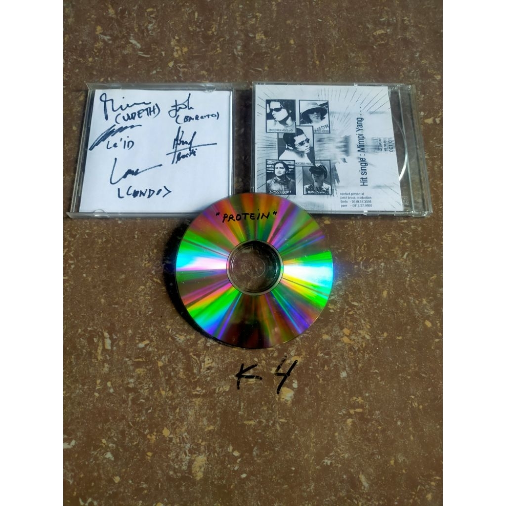 CD original Protein - ada tanda tangan penyanyi