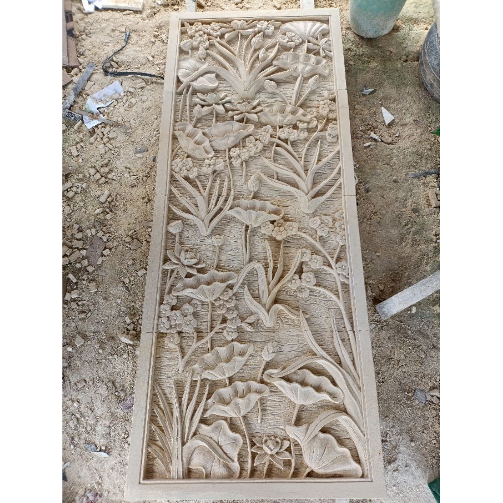 relief batu alam design bunga dan lotus