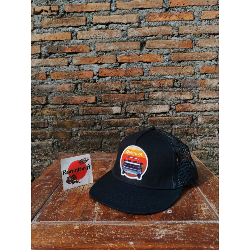 topi marmot trucker
