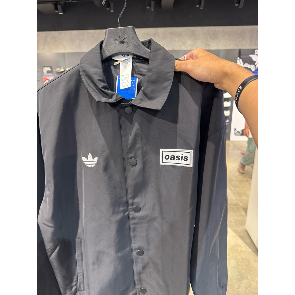 ADIDAS X OASIS COACH JACKET