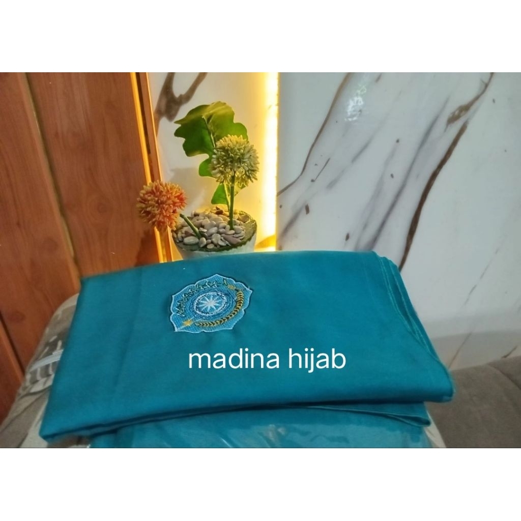 jilbab logo PKK warna tosca warna hijau tosca biru tosca tepian jahit