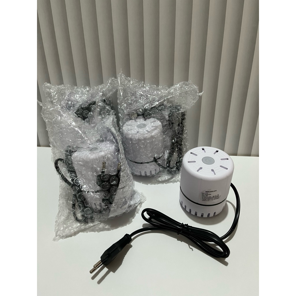 Alat Vakum Elektrik Pakaian Warna Putih / Alat Vakum Baju