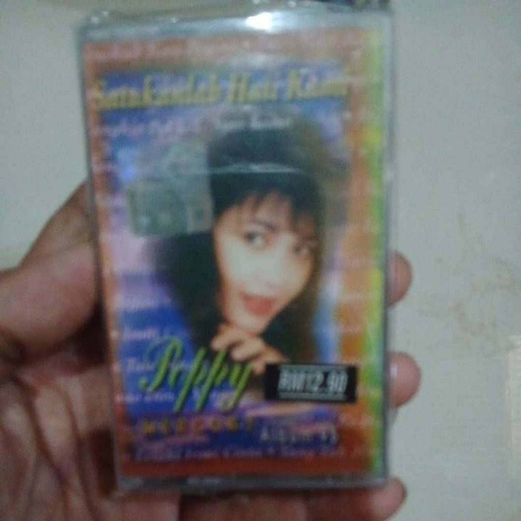 kaset pita poppy mercury satukanlah hati kami