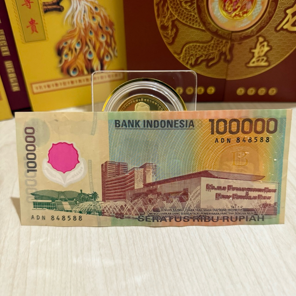Uang kuno 100000 plastik tahun 1999 seri triple ADN 848588