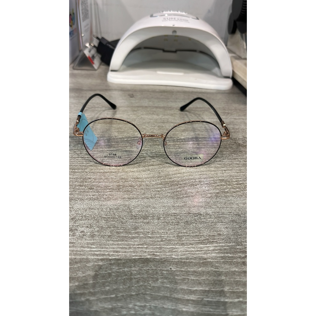 frame kacamata bulat lensa essilor