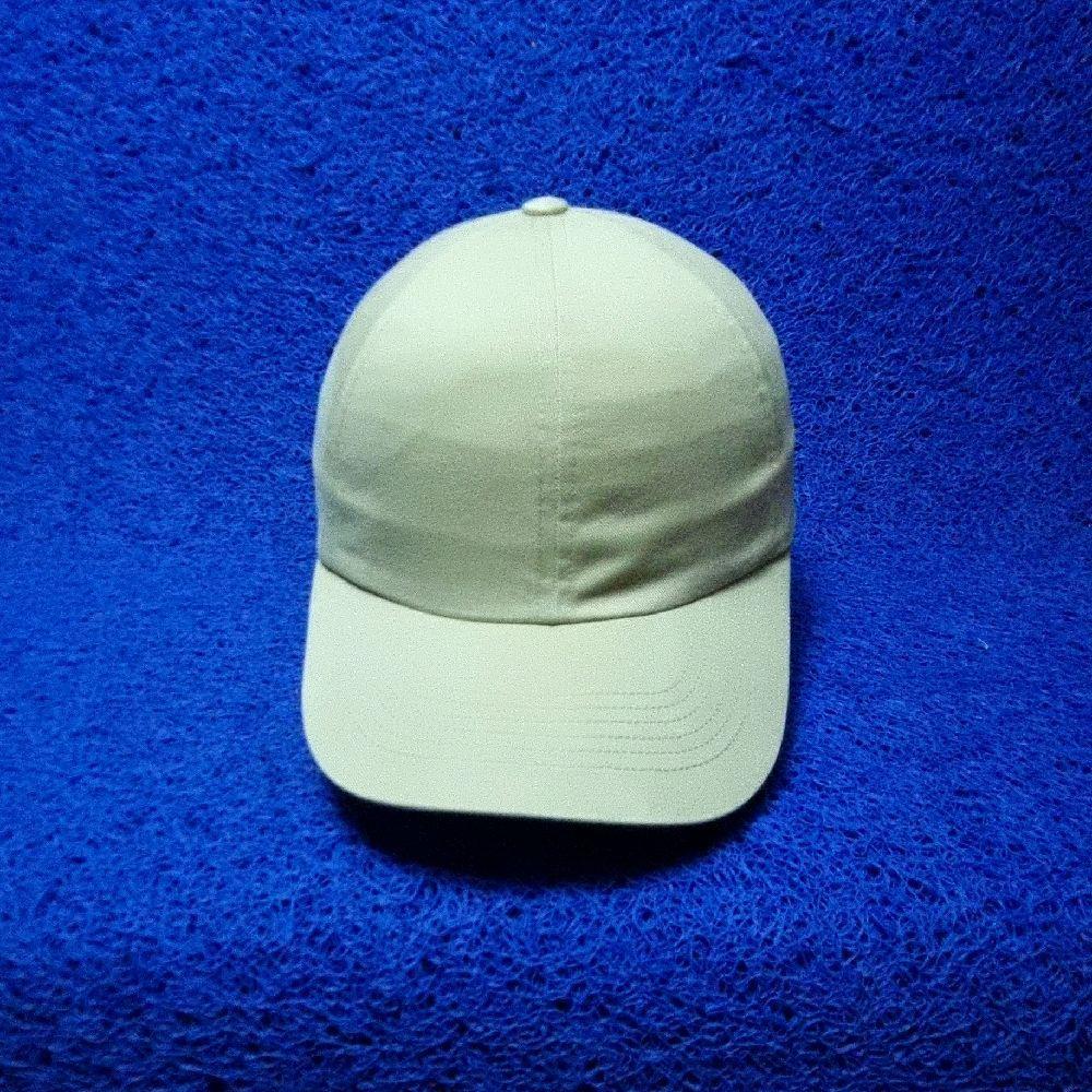 topi uniqlo cream leather strap