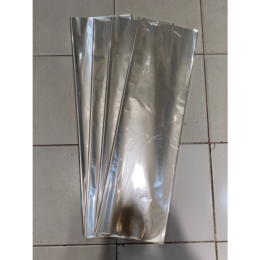 

Plastik Parcel Kado Kaca Bening Polos 70 cm x 80 cm 50 Lembar