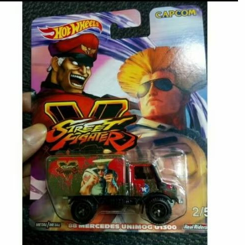 hot wheels street fighter 88 Mercedes-Benz Unimog u1300 premium pop culture ban karet off road truck