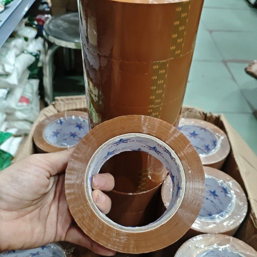 

Lakban seven star coklat 45 mm 200 yard 1 roll isi 6