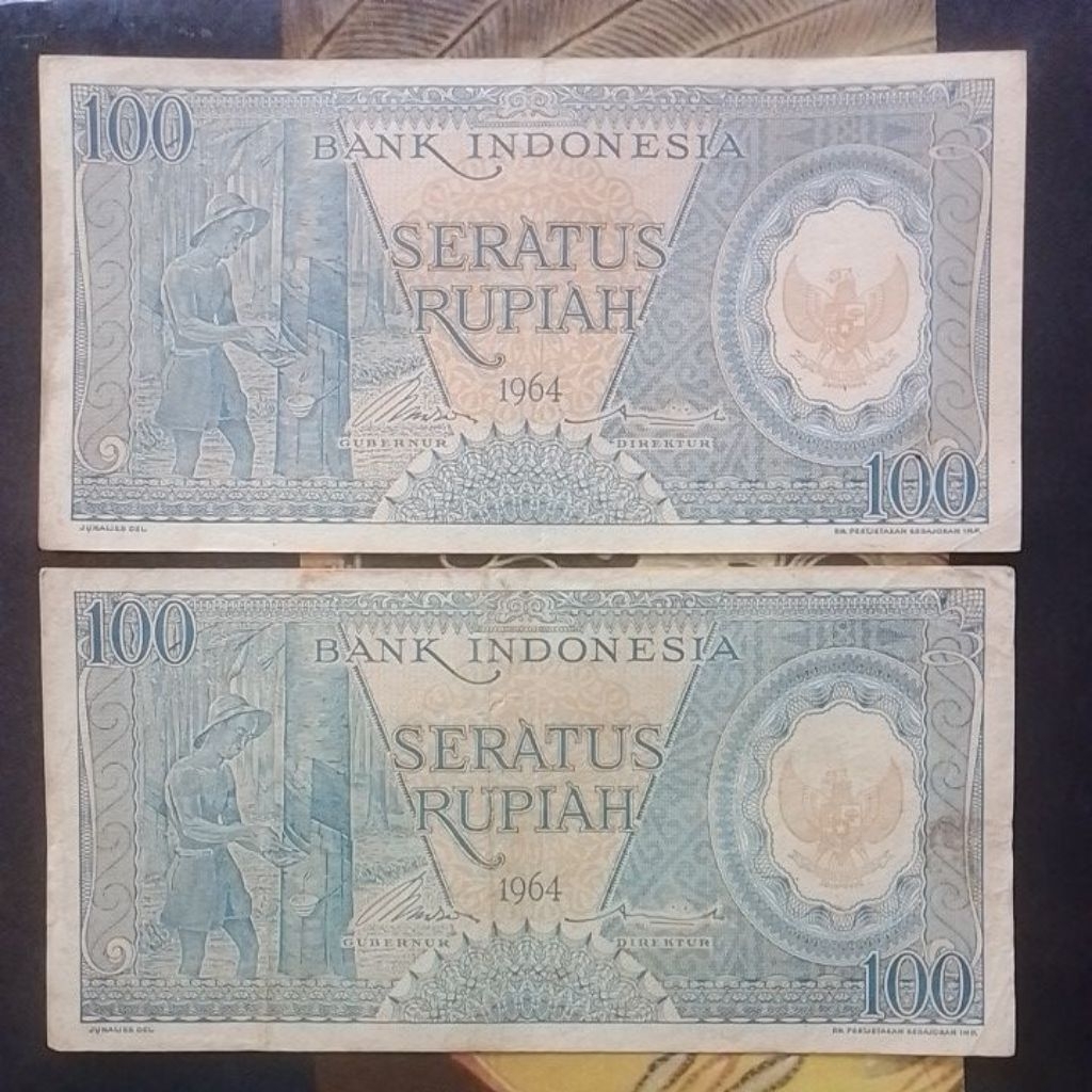 UANG KUNO 100 RUPIAH PEKERJA BIRU TAHUN 1964 BEKAS PAKAI