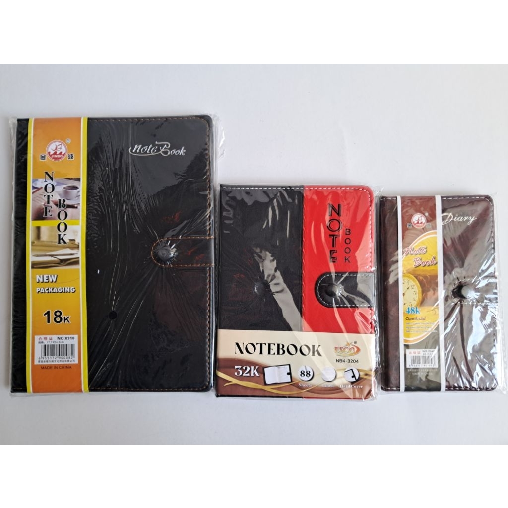 Notebook kulit atau buku agenda kancing